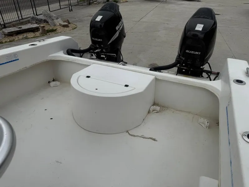 Slide: The Image of 2005 Twin Vee 26 Center Console boat with dual Suzuki outboard motors. - 10