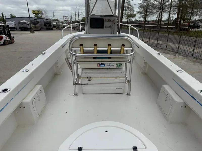 Slide: The Image of 2005 Twin Vee 26 Center Console boat, spacious deck, rod holders, and storage compartments. - 11