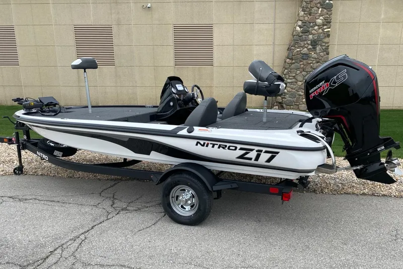 The Image of 2025 Nitro Z17 boat with trailer, parked outdoors, featuring sleek design and powerful engine. - 0