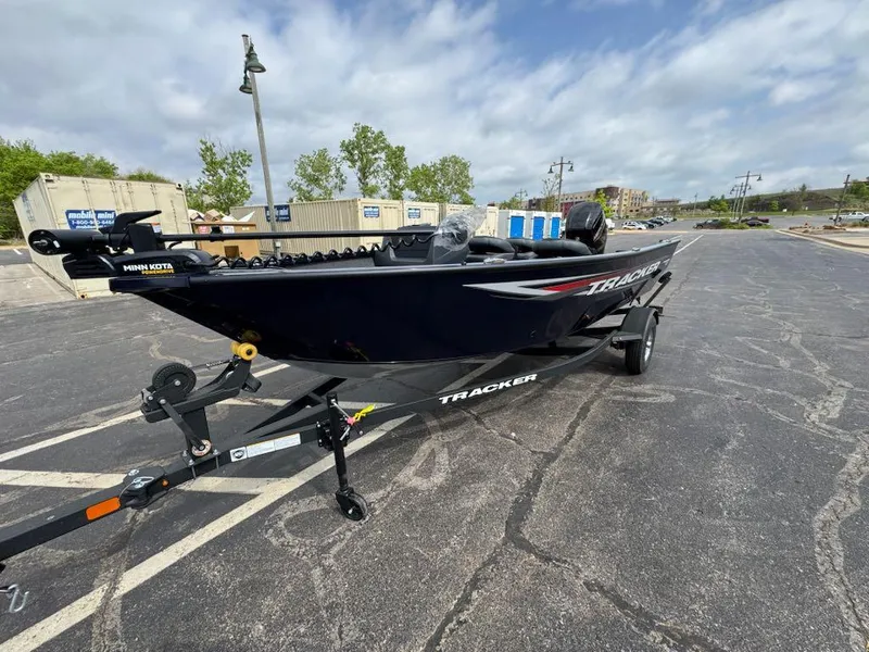 Slide: The Image of 2025 Tracker Pro Team 190 boat on trailer in parking lot. - 4
