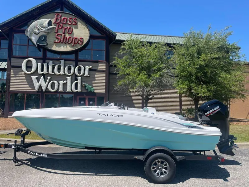 Slide: The Image of 2025 Tahoe T18 boat on trailer outside Bass Pro Shops Outdoor World. - 3