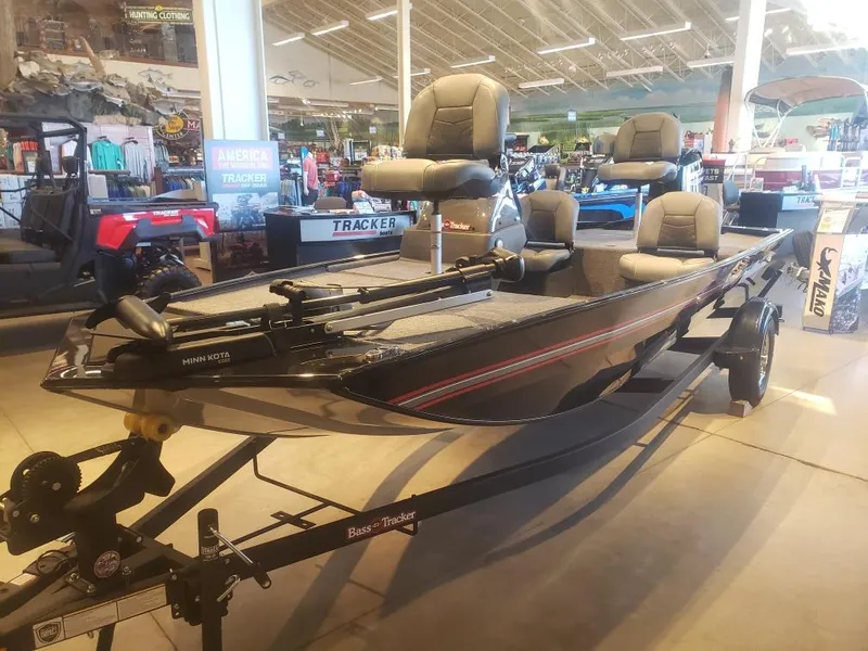 Slide: The Image of 2025 Tracker Bass Tracker Classic XL boat displayed in showroom. - 14