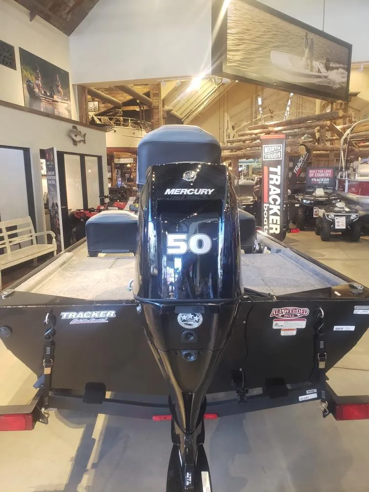 Slide: The Image of 2025 Tracker Bass Tracker Classic XL with Mercury 50 engine in showroom. - 15