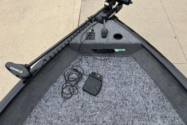 Slide: The Image of 2025 Tracker Pro Guide V-175 WT boat interior with trolling motor and foot pedal. - 3