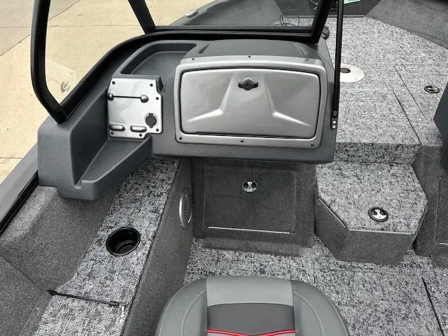 Slide: The Image of 2025 Tracker Pro Guide V-175 WT boat interior with gray seating and storage compartments. - 5