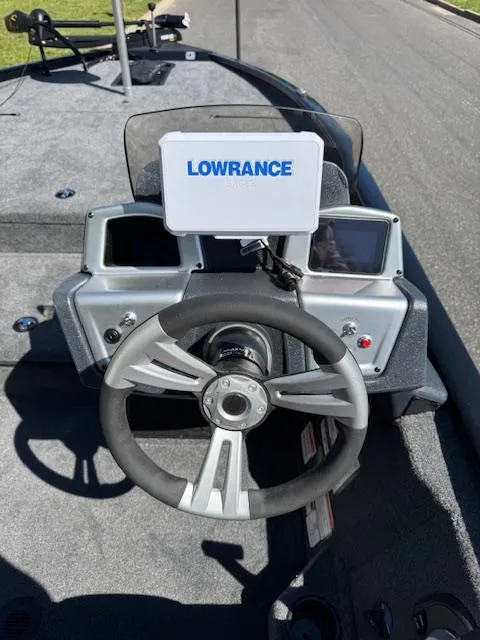 Slide: The Image of Steering console of 2025 Tracker Savage 215 boat with Lowrance navigation system. - 11