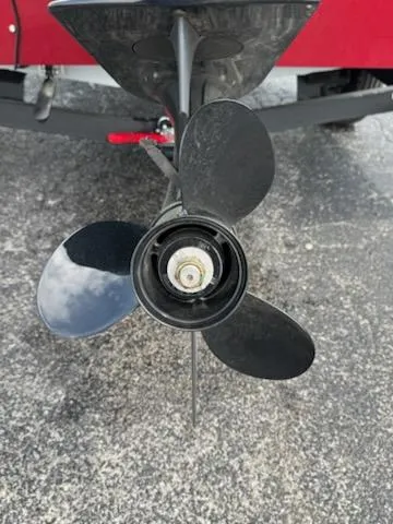 Slide: The Image of 2025 Tracker Pro Team 190 boat propeller on pavement background. - 3