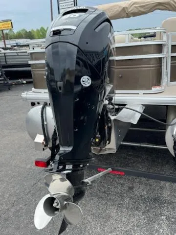 Slide: The Image of 2025 Sun Tracker SportFish 20 DLX pontoon boat with powerful outboard motor. - 3