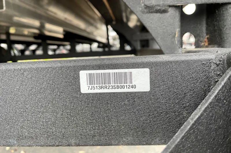 Slide: The Image of Barcode and serial number on 2025 Sun Tracker SportFish 22 XP3 boat trailer frame. - 87
