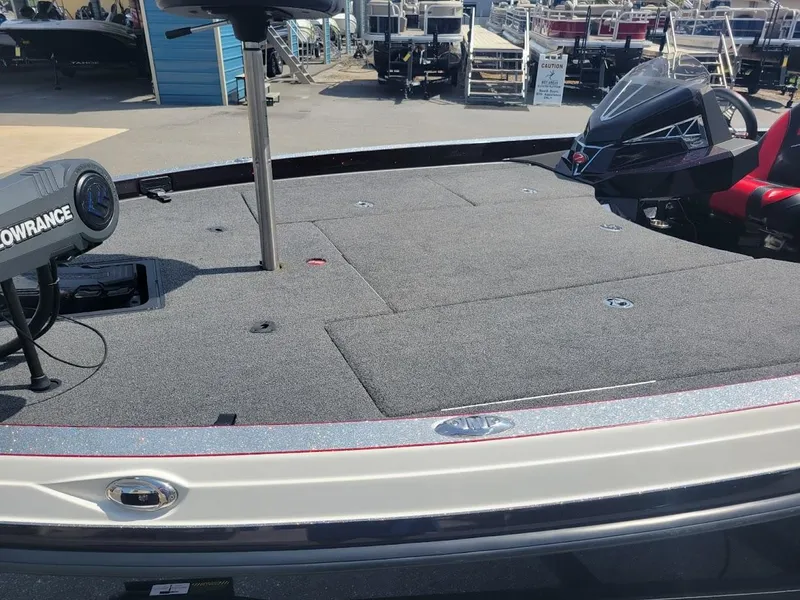 Slide: The Image of 2021 Ranger Z520L boat deck with fishing equipment and seating. - 10