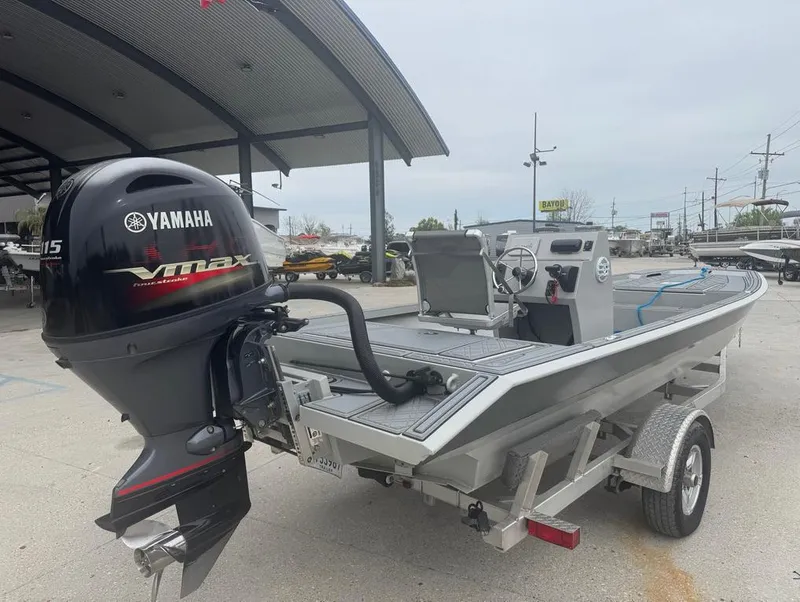 Slide: The Image of Custom Rene Gros 20 CC boat with Yamaha VMAX engine, parked on a trailer, 2023 model. - 6