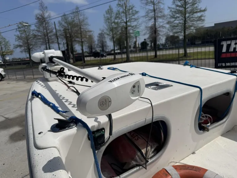 Slide: The Image of 2010 Carolina Skiff DLV 178 boat with Minn Kota trolling motor on deck. - 10