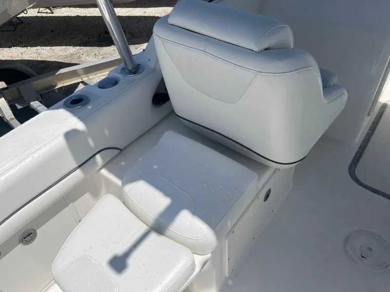 Slide: The Image of White seating area on a 2008 Century 2350 Dual Console boat. - 13