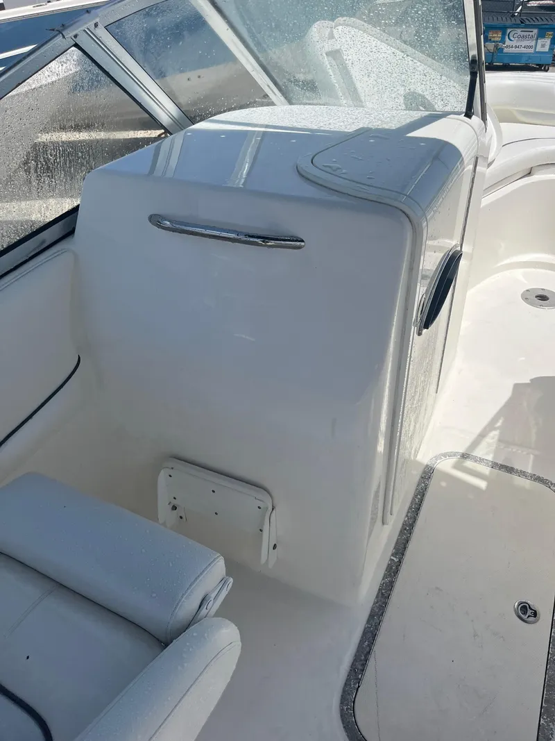 Slide: The Image of 2008 Century 2350 Dual Console boat interior with seating and console details. - 17