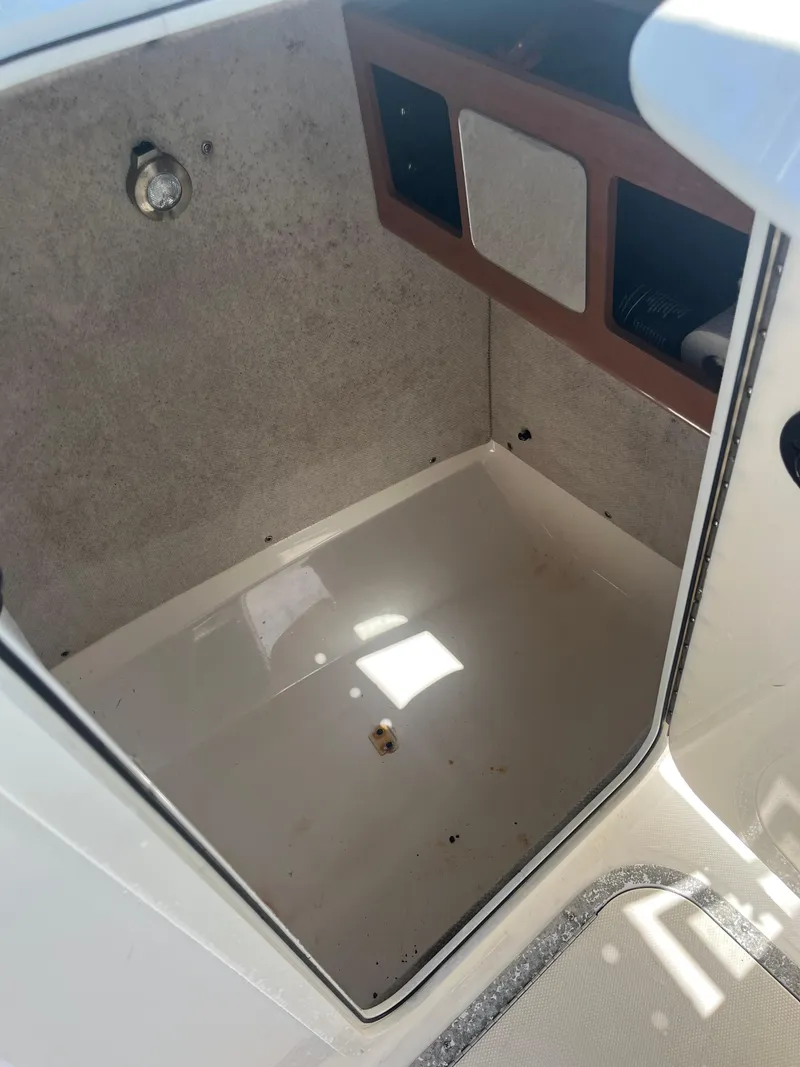 Slide: The Image of 2008 Century 2350 Dual Console boat interior storage compartment. - 20