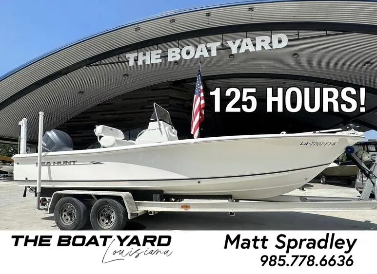 Slide: The Image of 2012 Sea Hunt BX 22 Pro boat on trailer at The Boat Yard, 125 hours usage. - 0