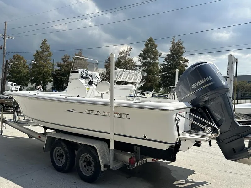 Slide: The Image of 2012 Sea Hunt BX 22 Pro boat on trailer with Yamaha outboard motor. - 3