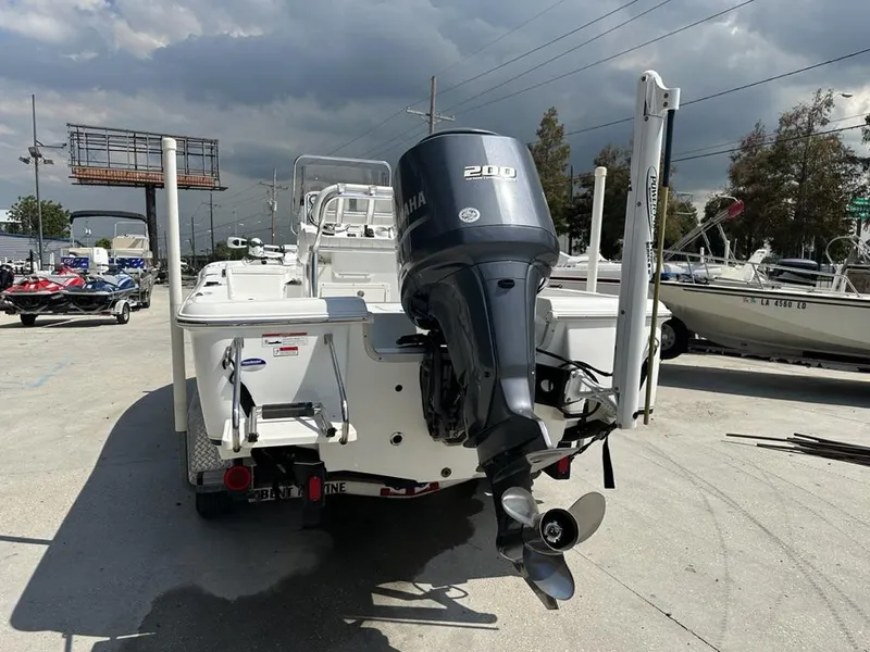 Slide: The Image of 2012 Sea Hunt BX 22 Pro boat with Yamaha 200 engine, parked outdoors. - 5