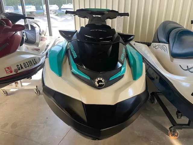 Slide: The Image of 2021 Sea-Doo GTX Pro jet ski in showroom, front view. - 2