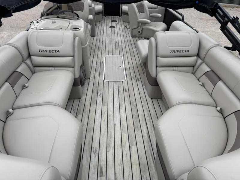 Slide: The Image of 2017 Trifecta SS 23RF pontoon boat with spacious seating and sleek design. - 5
