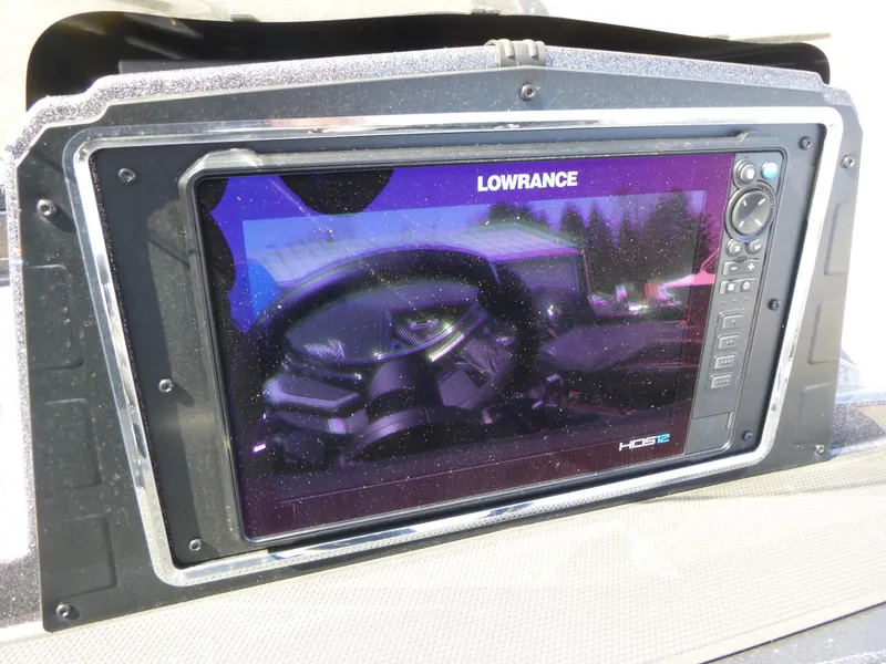Slide: The Image of Lowrance HDS display on 2024 Ranger Z521R boat dashboard. - 10