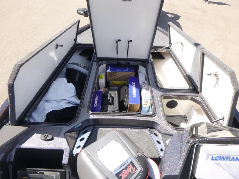 Slide: The Image of 2024 Ranger Z521R boat storage compartments with Lowrance equipment and accessories. - 12