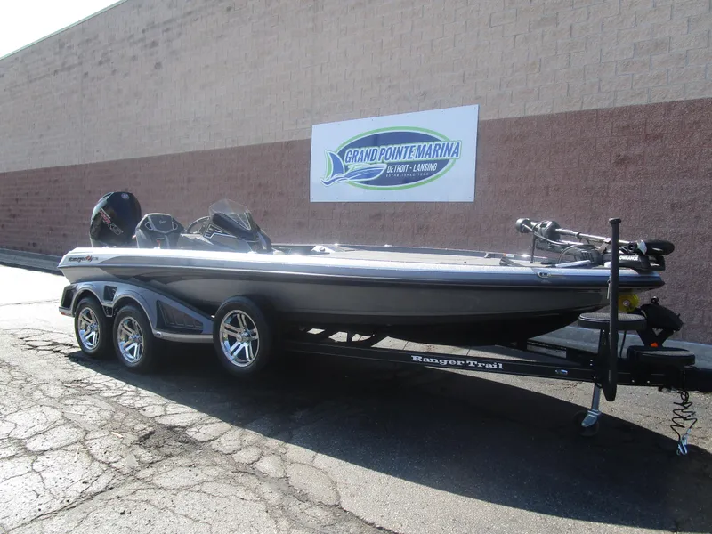 Slide: The Image of 2024 Ranger Z521R boat on trailer at Grand Pointe Marina. - 2