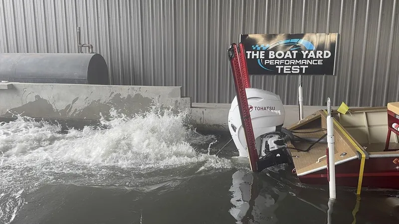 Slide: The Image of 2023 Custom Alumafab 20 CC boat undergoing performance test in water facility. - 17