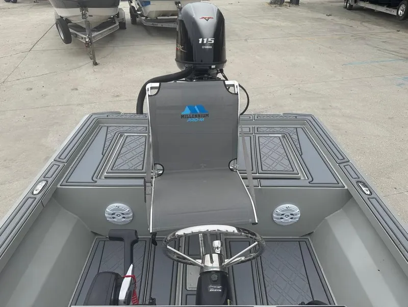 Slide: The Image of 2023 Custom Rene Gros 20 CC boat with 115 HP engine, featuring a sleek gray design. - 11