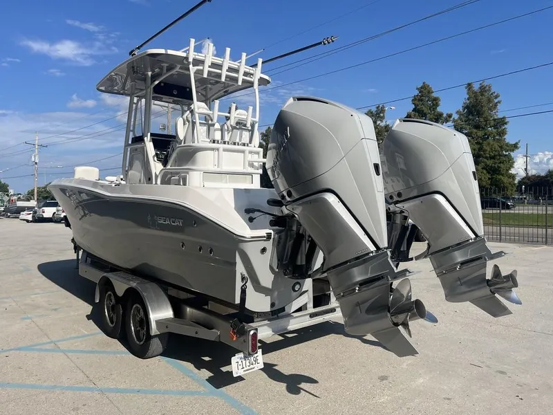 Slide: The Image of 2023 Sea Cat 262 Ultimate Edition boat compartment with plumbing and drainage system. - 16