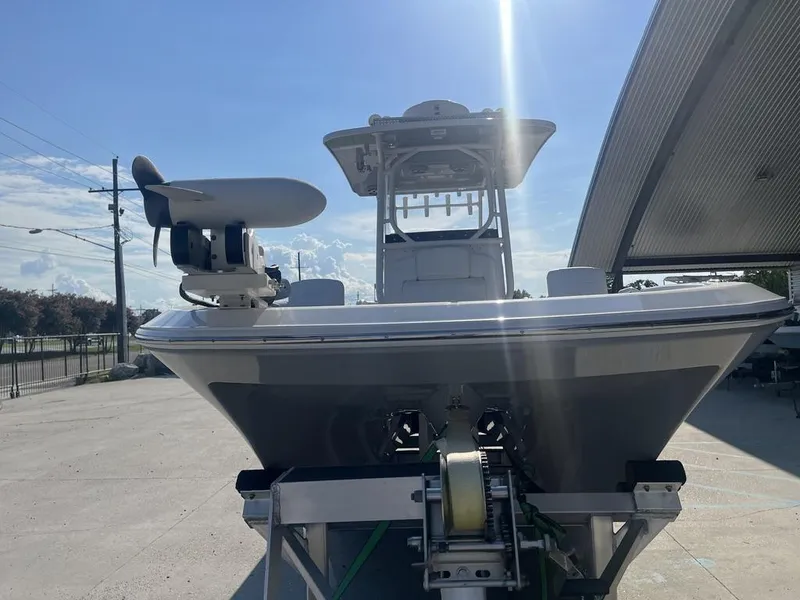 Slide: The Image of 2023 Sea Cat 262 Ultimate Edition boat storage compartment with plumbing and drainage features. - 17