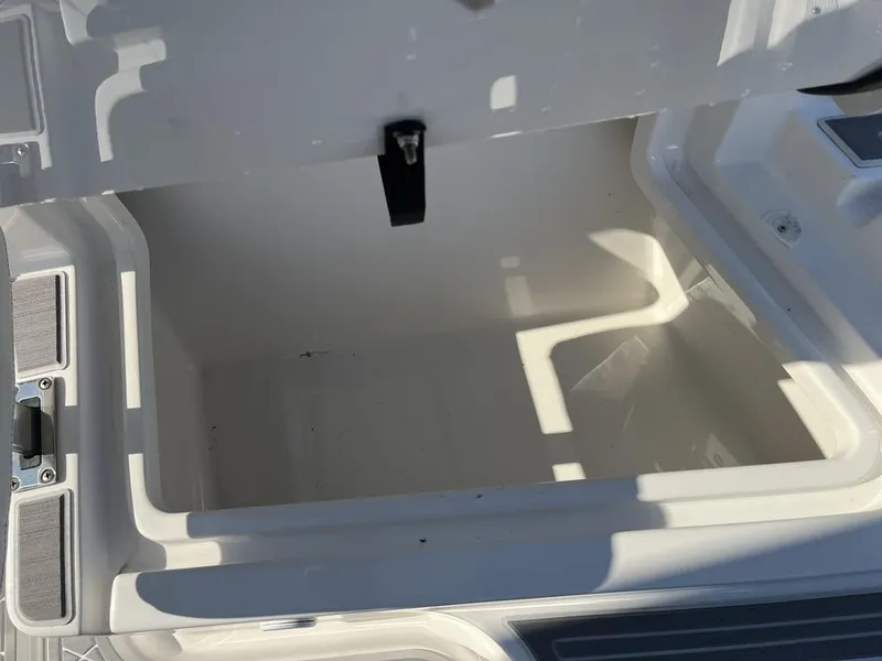 Slide: The Image of 2023 Sea Cat 262 Ultimate Edition boat on trailer under sunny sky. - 20