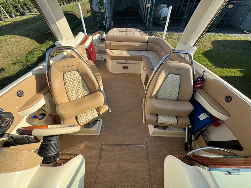 Slide: The Image of 2022 Chris-Craft Launch 25 GT interior with luxurious seating and elegant design. - 12