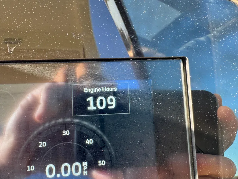 Slide: The Image of 2022 Chris-Craft Launch 25 GT dashboard showing 109 engine hours. - 23