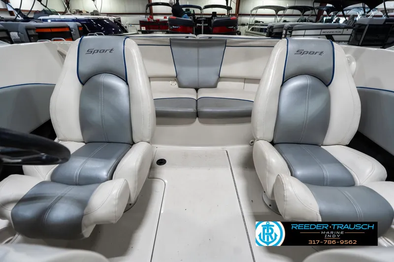 Slide: The Image of 2008 Sea Ray 185 Sport boat interior with gray and white seating. - 20