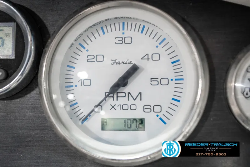 Slide: The Image of Tachometer of 2008 Sea Ray 185 Sport showing 1072 RPM. - 32