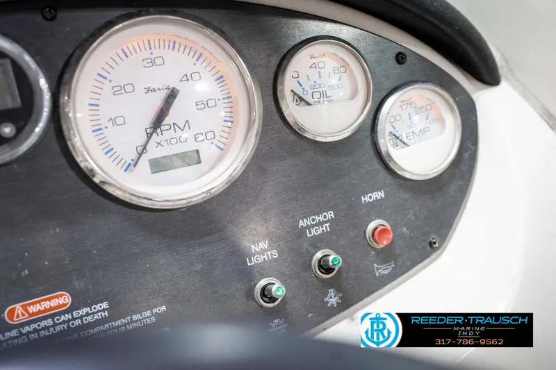 Slide: The Image of Dashboard of a 2008 Sea Ray 185 Sport boat with gauges and controls. - 33