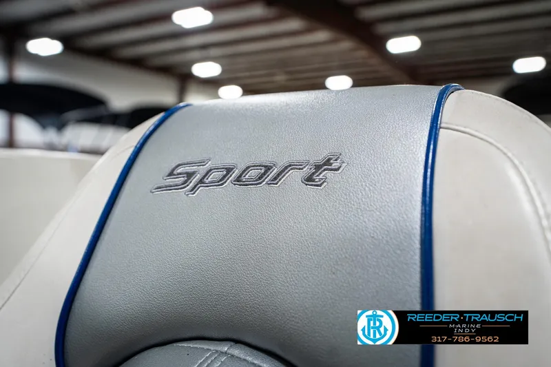 Slide: The Image of 2008 Sea Ray 185 Sport boat seat with "Sport" embroidery, featuring blue accents. - 35
