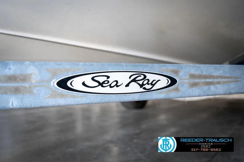 Slide: The Image of 2008 Sea Ray 185 Sport logo on boat trailer. - 48