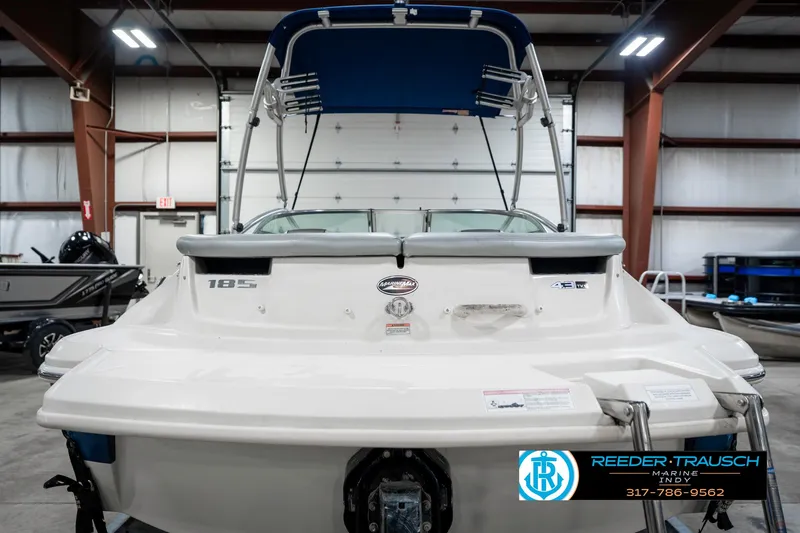 Slide: The Image of 2008 Sea Ray 185 Sport boat in indoor storage, rear view. - 9