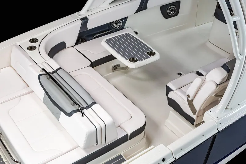 Slide: The Image of 2025 Chaparral 280 OSX boat interior with sleek seating and modern design. - 12