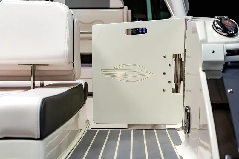 Slide: The Image of 2025 Chaparral 280 OSX boat interior with sleek seating and modern design. - 15