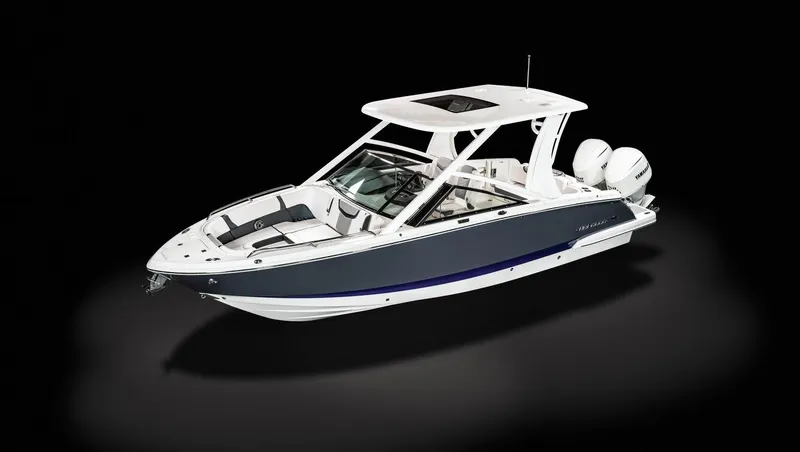 Slide: The Image of 2025 Chaparral 280 OSX boat with sleek design and dual engines on a black background. - 16