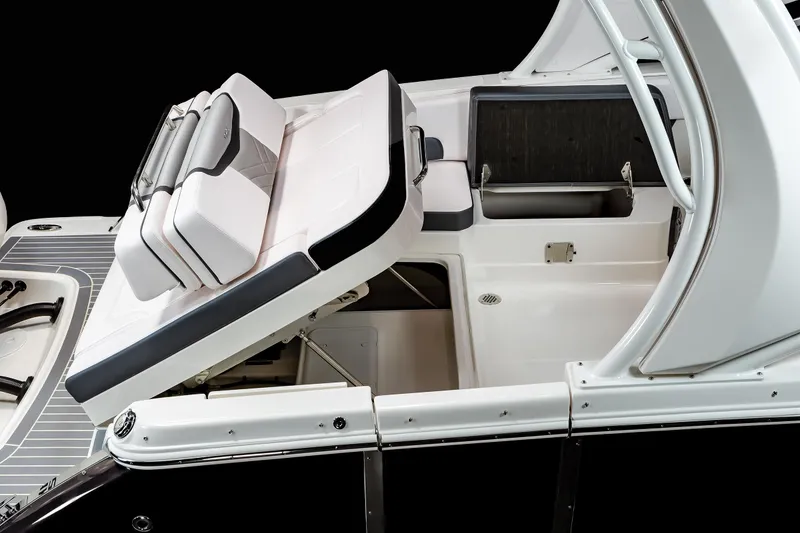 Slide: The Image of 2025 Chaparral 280 OSX boat interior with adjustable seating and storage compartments. - 33
