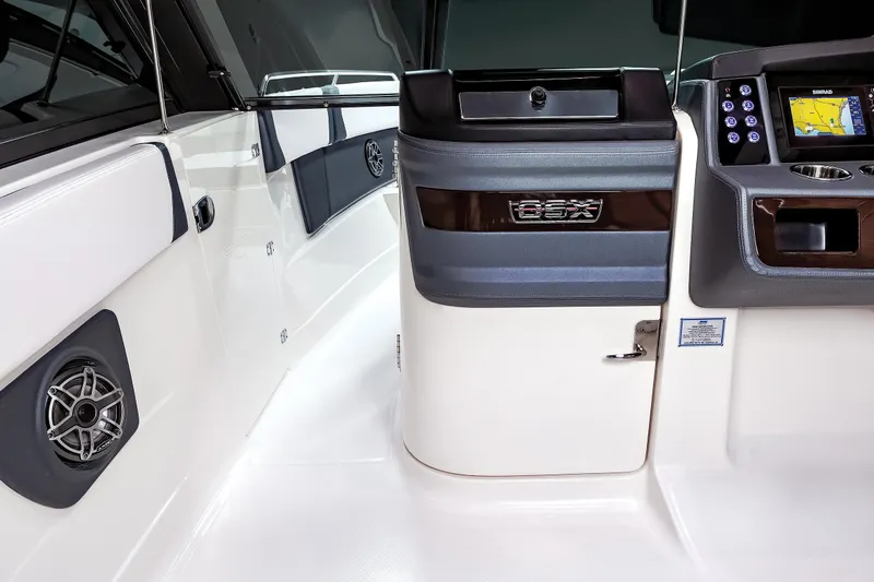 Slide: The Image of 2025 Chaparral 280 OSX boat interior with modern dashboard and sleek design. - 35