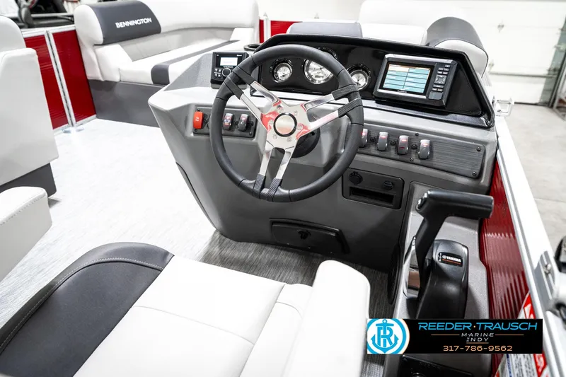 Slide: The Image of 2025 Bennington 20 SL boat dashboard with steering wheel and control panel. - 30