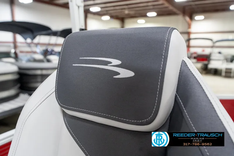 Slide: The Image of 2025 Bennington 20 SL boat seat with logo in showroom setting. - 40