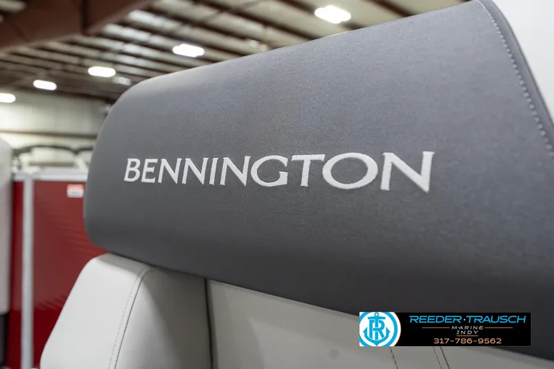Slide: The Image of Bennington 20 SL 2025 boat seat with logo in showroom setting. - 41