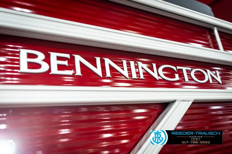 Slide: The Image of 2025 Bennington 20 SL boat logo on red background, Reeder-Trausch Marine branding. - 46