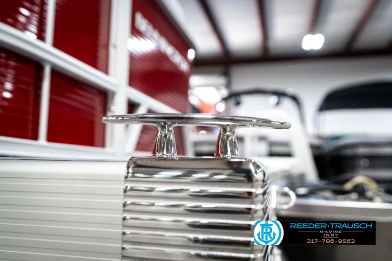 Slide: The Image of 2025 Bennington 20 SL boat detail in showroom with polished metal cleat. - 48